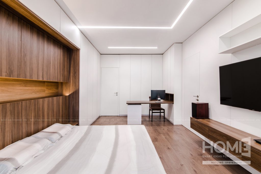 Không gian phòng ngủ với các ngăn kệ được thiết kế thông minh, tối ưu công năng sử dụng